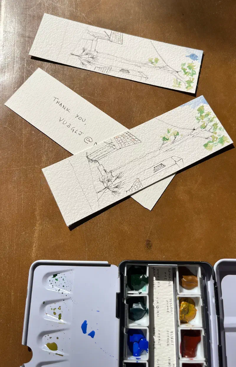 Handpainted bookmarks as souvenirs for participants